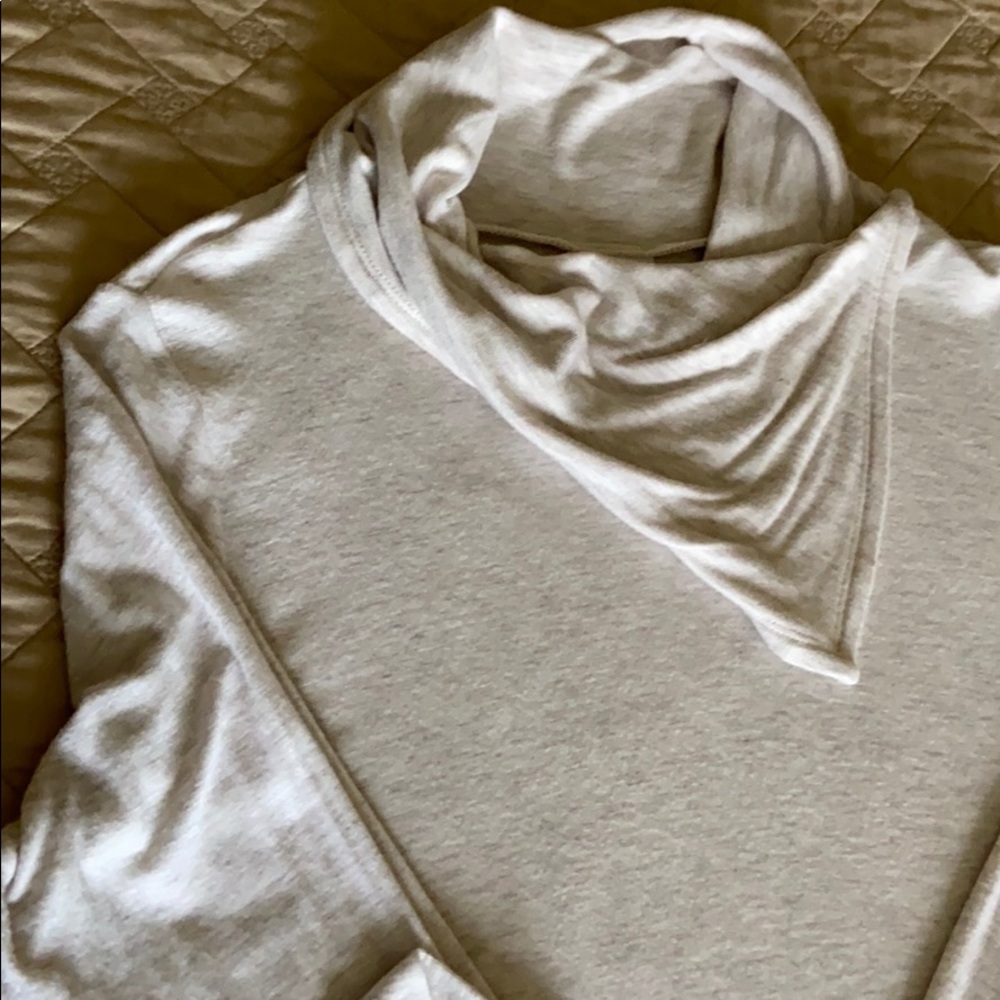 Cabi oatmeal cream and tan tee.